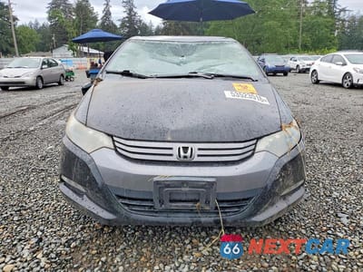 Piąte zdjęcie samochodu w środku: 2010 HONDA INSIGHT EX VIN:JHMZE2H79AS023853 - miniatura