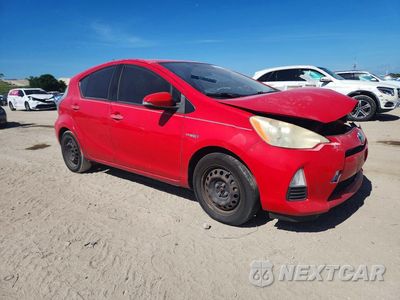 Czwarte zdjęcie samochodu z boku: 2012 TOYOTA PRIUS C ONE VIN:JTDKDTB33C1025849 - miniatura