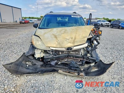 Piąte zdjęcie samochodu w środku: 2010 TOYOTA SIENNA LE 7-PASSENGER VIN:5TDKK4CC0AS289086 - miniatura