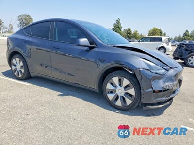Czwarte zdjęcie samochodu z boku: 2024 TESLA MODEL Y VIN:7SAYGDEE5RA245997 - miniatura