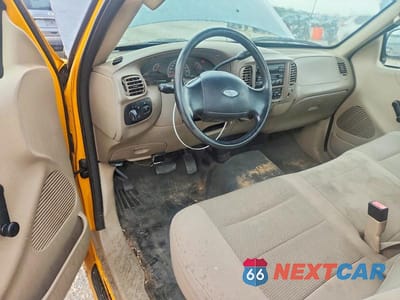 Zdjęcie 8 z 13 samochodu: 2003 FORD F150 VIN:2FTRF17293CA56521 - miniatura