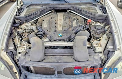 Zdjęcie 12 z 13 samochodu: 2013 BMW X5 XDRIVE50I VIN:5UXZV8C59D0C16872 - miniatura