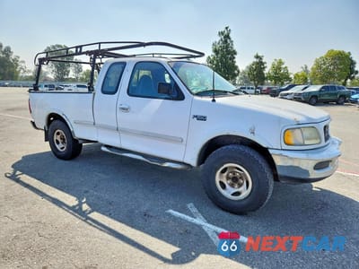 Czwarte zdjęcie samochodu z boku: 1997 FORD F150 VIN:1FTEX18L4VKC70348 - miniatura
