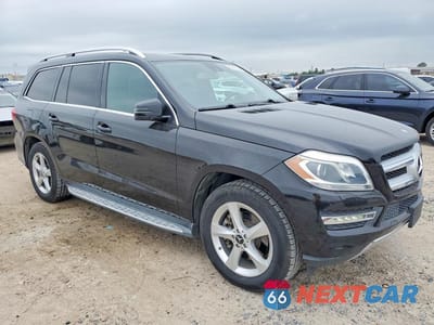 Czwarte zdjęcie samochodu z boku: 2014 MERCEDES-BENZ GL 450 4MATIC VIN:4JGDF7CE7EA440147 - miniatura