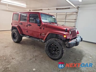 Czwarte zdjęcie samochodu z boku: 2013 JEEP WRANGLER UNLIMITED SAHARA VIN:1C4BJWEG7DL503365 - miniatura