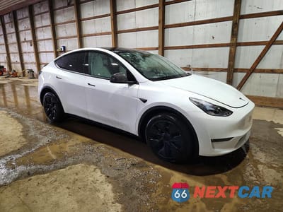 Czwarte zdjęcie samochodu z boku: 2025 TESLA MODEL Y VIN:7SAYGDEE9SF223011 - miniatura