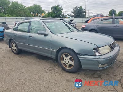 Czwarte zdjęcie samochodu z boku: 1999 TOYOTA AVALON XLS VIN:4T1BF18B3XU322312 - miniatura