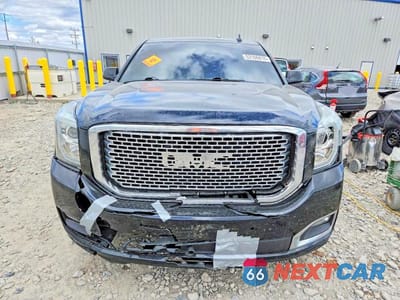 Piąte zdjęcie samochodu w środku: 2017 GMC YUKON DENALI VIN:1GKS2CKJ5HR147601 - miniatura