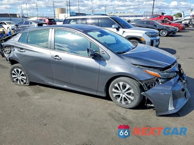 Czwarte zdjęcie samochodu z boku: 2022 TOYOTA PRIUS PRIME XLE VIN:JTDKAMFP8N3215794 - miniatura
