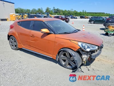 Czwarte zdjęcie samochodu z boku: 2014 HYUNDAI VELOSTER TURBO VIN:KMHTC6AE7EU205585 - miniatura