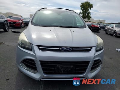 Zdjęcie 6 z 13 samochodu: 2014 FORD ESCAPE TITANIUM VIN:1FMCU0J91EUA77938 - miniatura