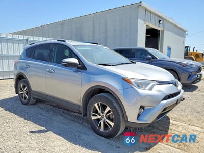 Czwarte zdjęcie samochodu z boku: 2017 TOYOTA RAV4 XLE VIN:2T3WFREV7HW360858 - miniatura
