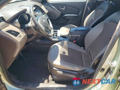 Zdjęcie 7 z 13 samochodu: 2011 HYUNDAI TUCSON GLS VIN:KM8JUCAC7BU264472 - miniatura