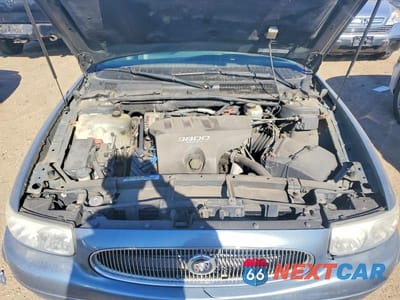 Zdjęcie 11 z 12 samochodu: 2000 BUICK LESABRE CUSTOM VIN:1G4HP54K7Y4259110 - miniatura