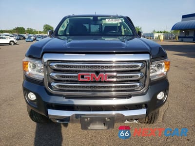 Piąte zdjęcie samochodu w środku: 2016 GMC CANYON SLT VIN:1GTG6DE38G1335762 - miniatura
