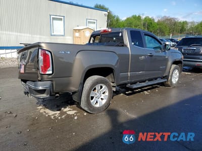 Trzecie zdjęcie samochodu z tyłu: 2016 GMC CANYON SLE VIN:1GTH6CE36G1101747 - miniatura
