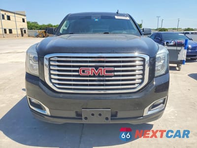 Piąte zdjęcie samochodu w środku: 2017 GMC YUKON SLT VIN:1GKS2BKC3HR273032 - miniatura