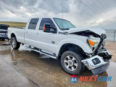 Czwarte zdjęcie samochodu z boku: 2014 FORD F350 SUPER DUTY VIN:1FT8W3BT0EEA72806 - miniatura
