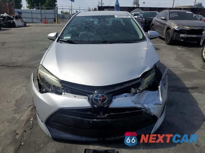 Piąte zdjęcie samochodu w środku: 2017 TOYOTA COROLLA L VIN:5YFBURHE0HP691467 - miniatura