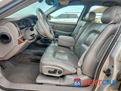 Zdjęcie 7 z 12 samochodu: 2003 BUICK PARK AVENUE VIN:1G4CW54K734154184 - miniatura