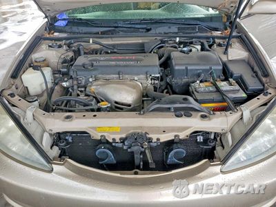 Zdjęcie 11 z 12 samochodu: 2003 TOYOTA CAMRY LE VIN:4T1BE32K13U163792 - miniatura