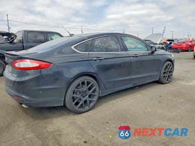 Trzecie zdjęcie samochodu z tyłu: 2013 FORD FUSION TITANIUM PHEV VIN:3FA6P0SU8DR365799 - miniatura