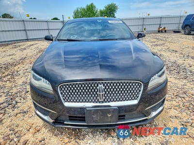 Piąte zdjęcie samochodu w środku: 2017 LINCOLN MKZ SELECT VIN:3LN6L5C94HR660574 - miniatura
