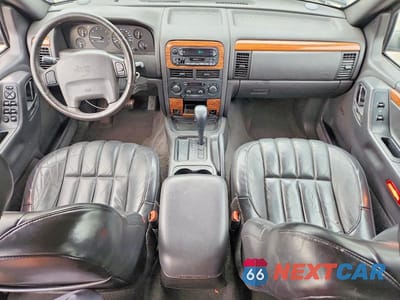 Zdjęcie 8 z 13 samochodu: 1999 JEEP GRAND CHEROKEE LIMITED VIN:1J4G268S3XC537241 - miniatura
