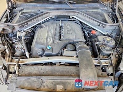 Zdjęcie 12 z 13 samochodu: 2012 BMW X5 XDRIVE35I VIN:5UXZV4C59CL991854 - miniatura