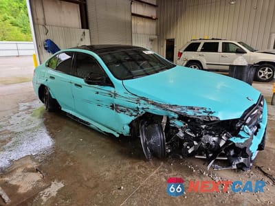 Czwarte zdjęcie samochodu z boku: 2025 BMW M5 VIN:WBS83FK02SCU40077 - miniatura