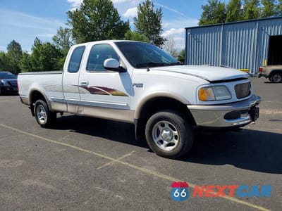 Czwarte zdjęcie samochodu z boku: 1997 FORD F150 VIN:1FTDX18W6VKD21340 - miniatura