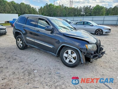 Czwarte zdjęcie samochodu z boku: 2011 JEEP GRAND CHEROKEE LAREDO VIN:1J4RR4GG3BC596823 - miniatura