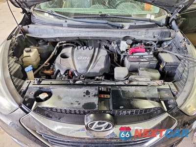 Zdjęcie 12 z 13 samochodu: 2015 HYUNDAI TUCSON LIMITED VIN:KM8JU3AG7FU009653 - miniatura