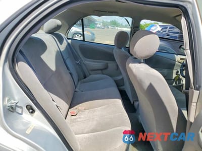 Zdjęcie 10 z 12 samochodu: 2002 TOYOTA COROLLA CE VIN:2T1BR12E02C558985 - miniatura