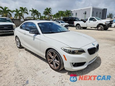 Czwarte zdjęcie samochodu z boku: 2014 BMW 228 I VIN:WBA1F5C51EV256274 - miniatura
