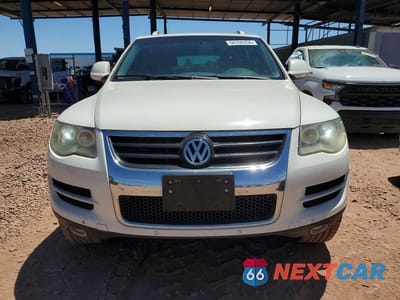 Piąte zdjęcie samochodu w środku: 2009 VOLKSWAGEN TOUAREG 2 V6 TDI VIN:WVGFM77L39D035902 - miniatura