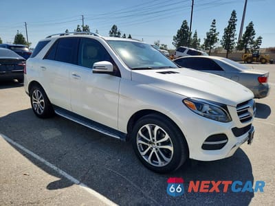Czwarte zdjęcie samochodu z boku: 2017 MERCEDES-BENZ GLE 350 VIN:4JGDA5JB5HA852504 - miniatura