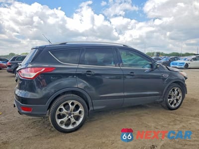 Trzecie zdjęcie samochodu z tyłu: 2015 FORD ESCAPE TITANIUM VIN:1FMCU9J98FUA52167 - miniatura