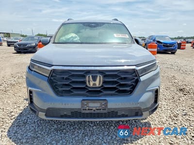 Piąte zdjęcie samochodu w środku: 2025 HONDA PILOT TOURING VIN:5FNYG2H71SB008186 - miniatura