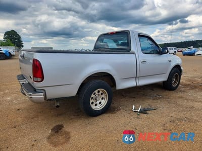 Trzecie zdjęcie samochodu z tyłu: 2002 FORD F150 VIN:1FTRF17202NB33138 - miniatura