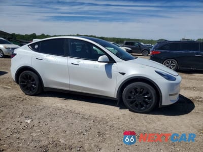 Czwarte zdjęcie samochodu z boku: 2022 TESLA MODEL Y VIN:7SAYGDEE6NA016593 - miniatura