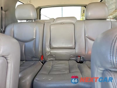 Zdjęcie 10 z 13 samochodu: 2004 GMC YUKON VIN:1GKEK13Z34J167618 - miniatura