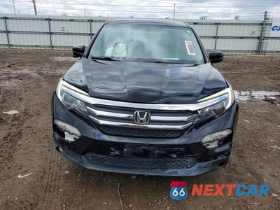 Piąte zdjęcie samochodu w środku: 2017 HONDA PILOT EXL VIN:5FNYF5H54HB016522 - miniatura