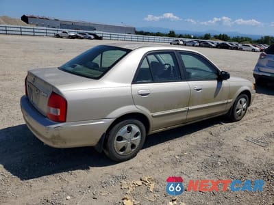 Trzecie zdjęcie samochodu z tyłu: 1999 MAZDA PROTEGE DX VIN:JM1BJ2228X0194402 - miniatura