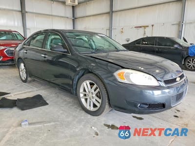 Czwarte zdjęcie samochodu z boku: 2014 CHEVROLET IMPALA LIMITED LTZ VIN:2G1WC5E31E1143223 - miniatura