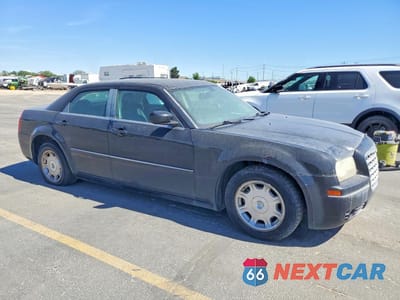 Czwarte zdjęcie samochodu z boku: 2009 CHRYSLER 300 TOURING VIN:2C3LA53V49H564259 - miniatura