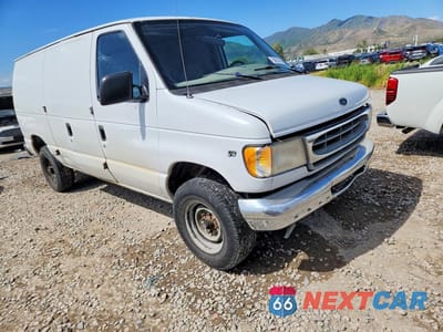 Czwarte zdjęcie samochodu z boku: 1998 FORD ECONOLINE E350 VAN VIN:1FTSE34L3WH827397 - miniatura