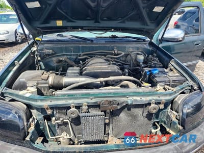 Zdjęcie 11 z 12 samochodu: 2000 TOYOTA TUNDRA SR5 VIN:5TBBT4418YS070762 - miniatura