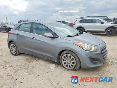 Czwarte zdjęcie samochodu z boku: 2016 HYUNDAI ELANTRA GT BASE VIN:KMHD35LH5GU323434 - miniatura