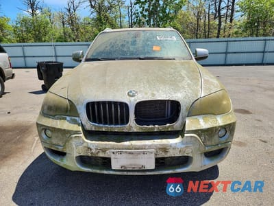 Piąte zdjęcie samochodu w środku: 2009 BMW X5 VIN:5UXFE43579L273487 - miniatura